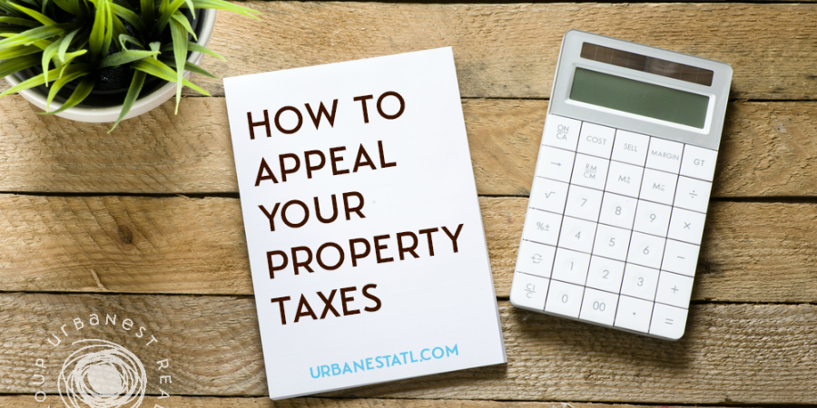 Desk, calculator and tips for appealing property taxes in Georgia