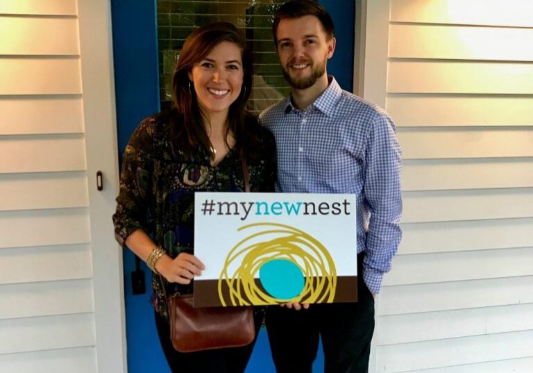 East Atlanta home buyers in front of their new Urban Nest!